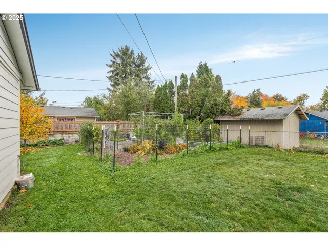 a view of a backyard with a garden