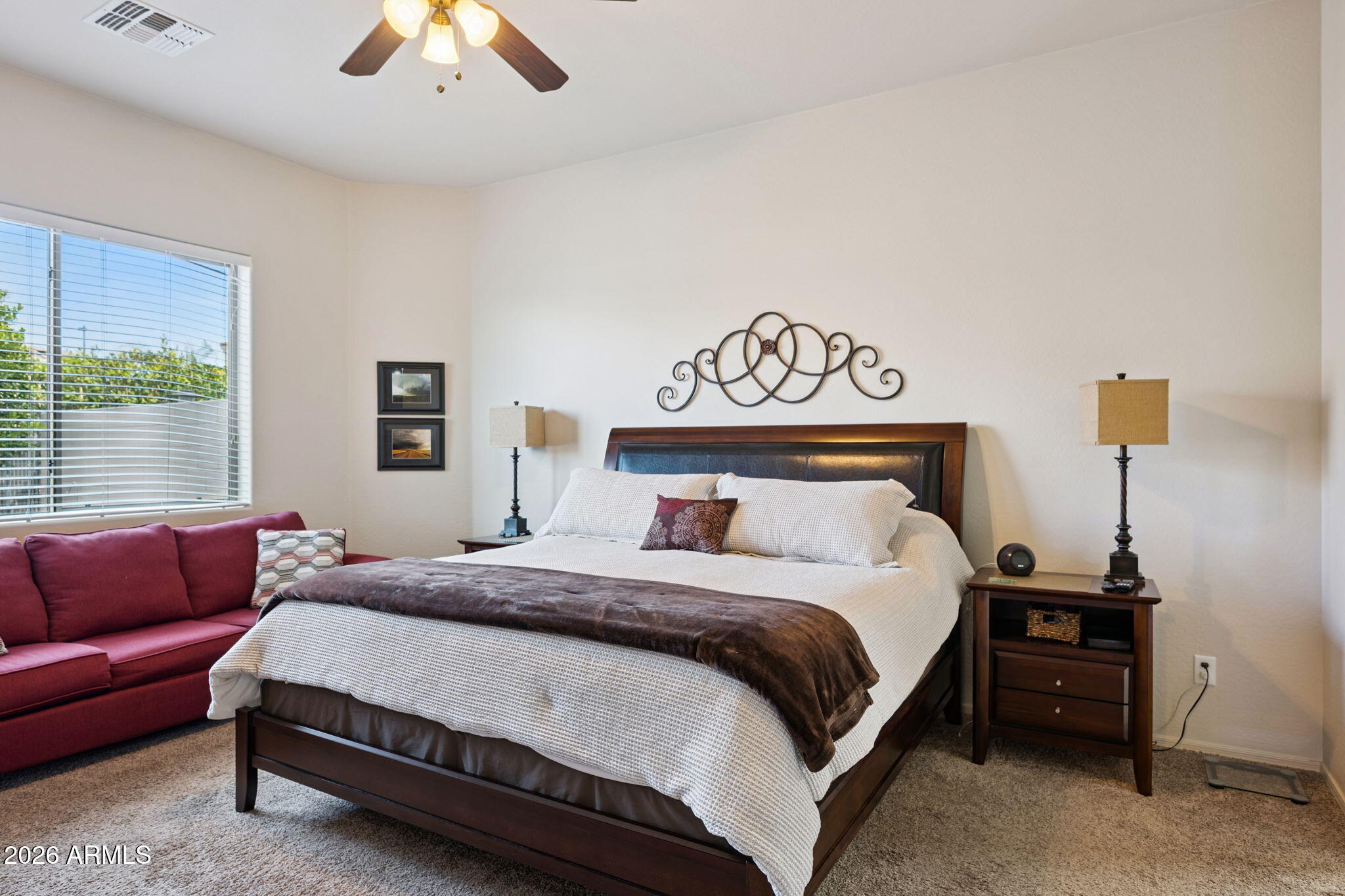 6202 East McKellips Road, Unit 107 Mesa, AZ 85215 - Photo 15 of 32 a bedroom with a bed and window