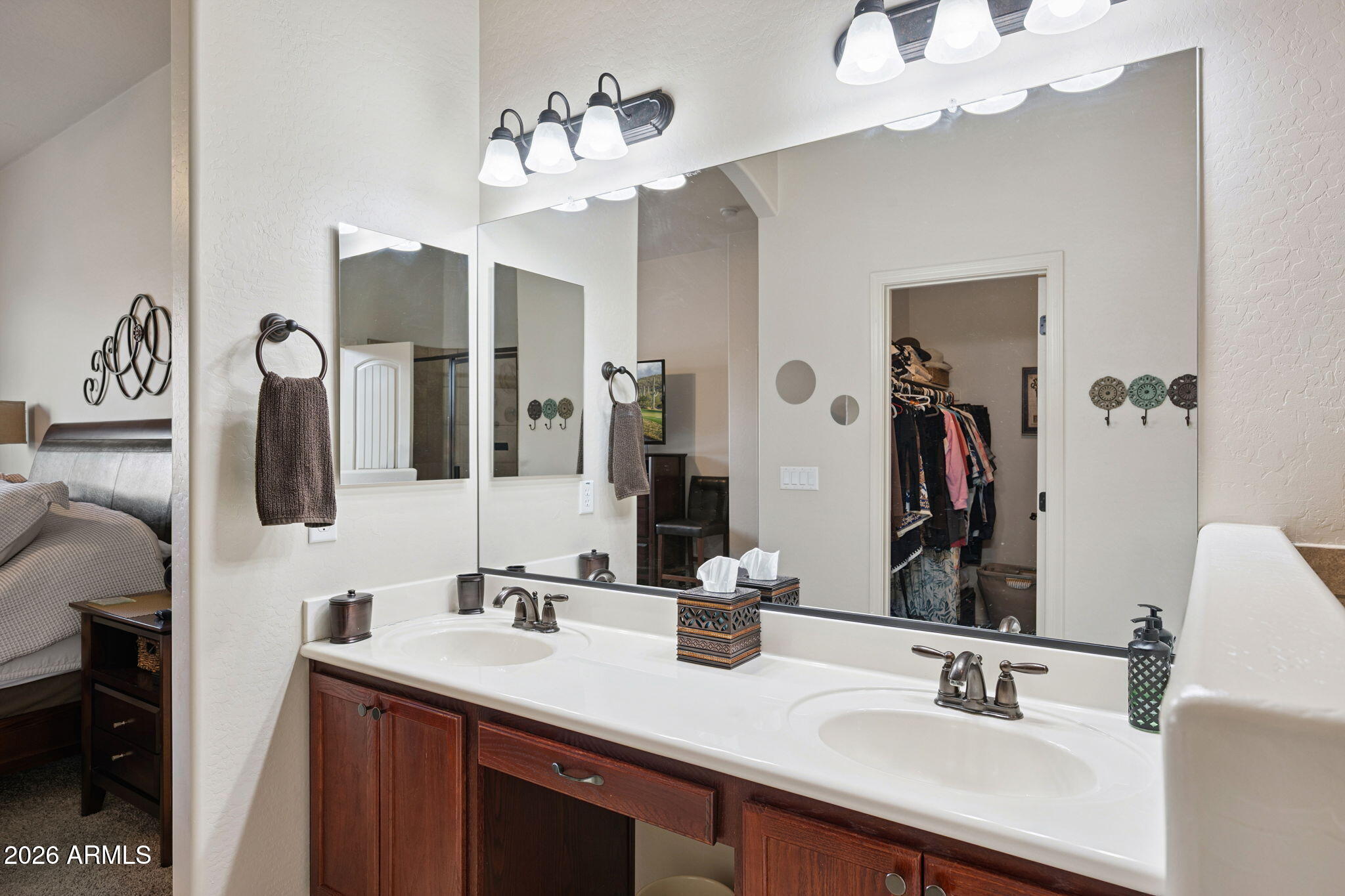 6202 East McKellips Road, Unit 107 Mesa, AZ 85215 - Photo 18 of 32 a bathroom with a sink double vanity and a mirror