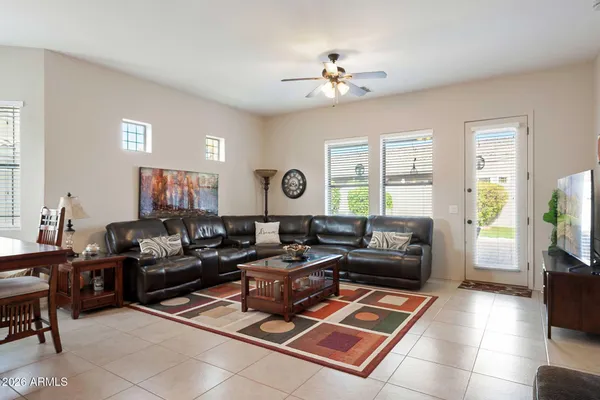 a living room with furniture and a window