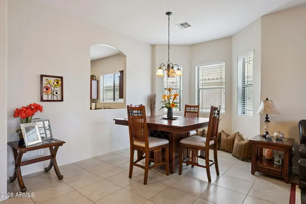 a view of a dining room with furniture