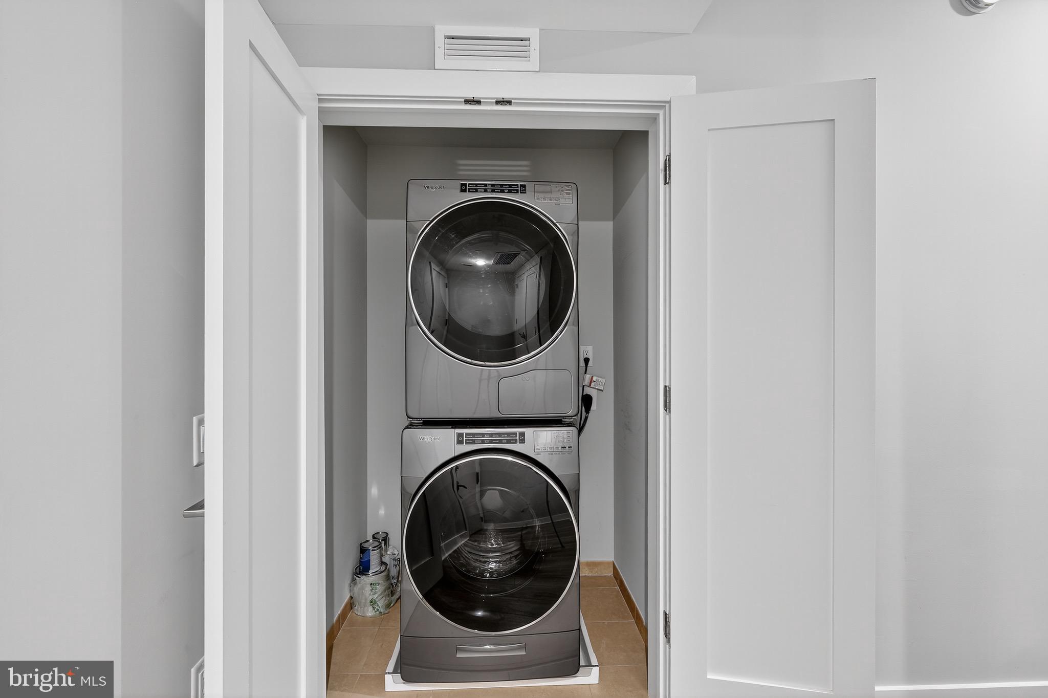 88 V Street Southwest, Unit 509 Washington, DC 20024 - Photo 32 of 36 a utility room with dryer and washer