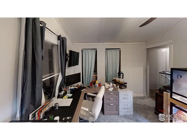 a room with furniture and a mirror