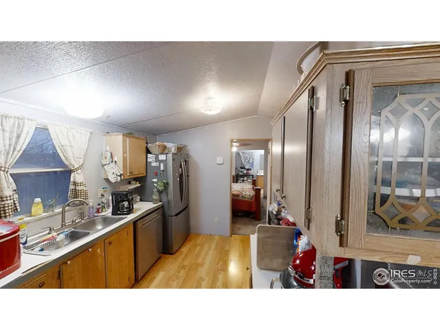 a bathroom with a sink double vanity and a mirror
