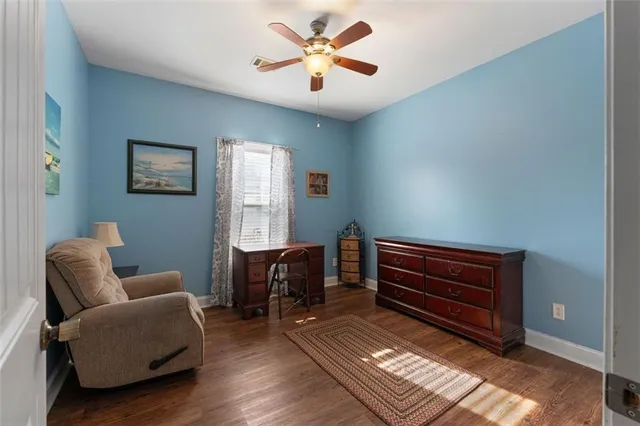 a livingroom with furniture and a window