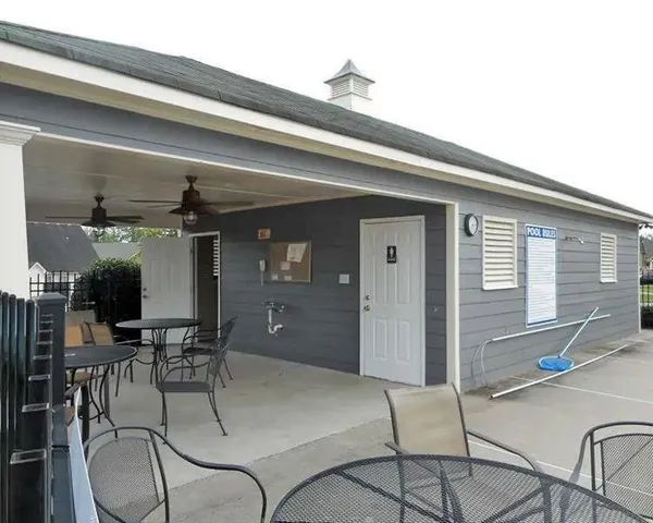 a view of a livingroom with furniture and windows