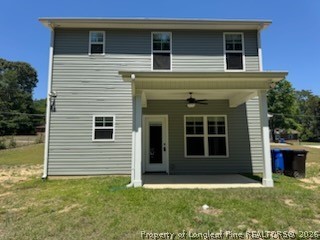 390 Summerhill Road Fayetteville, NC 28303 - Photo 2 of 27 a view of a house with a yard