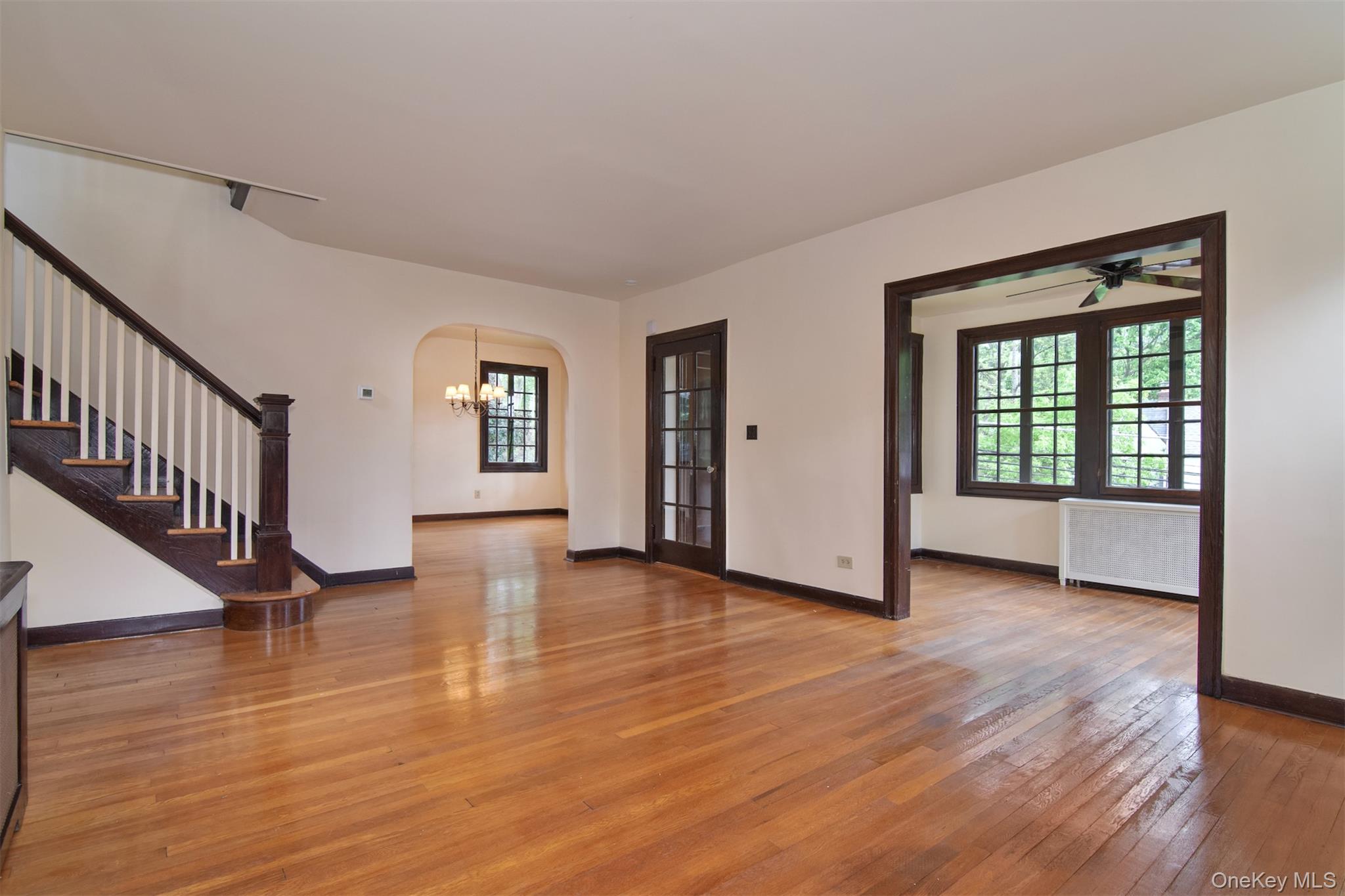 370 Scarsdale Road Tuckahoe, NY 10707 - Photo 6 of 25 View from living room to sun room, entry and dining room