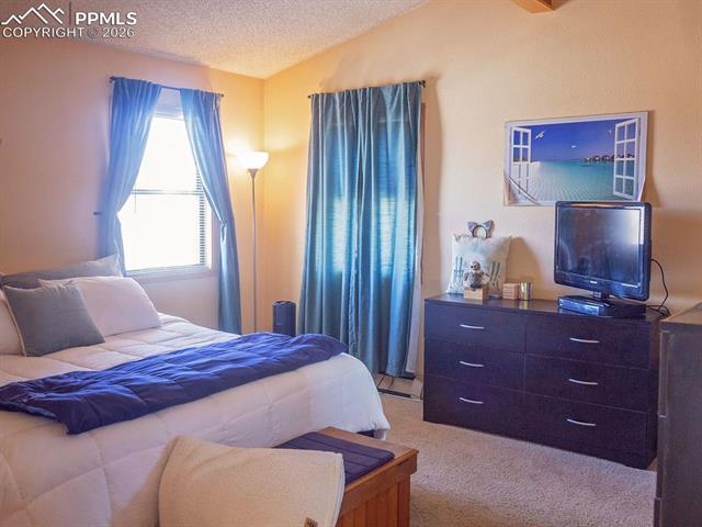 20 Sommerlyn Road Colorado Springs, CO 80906 - Photo 18 of 50 20 Sommerlyn Rd: Primary Bedroom Suite