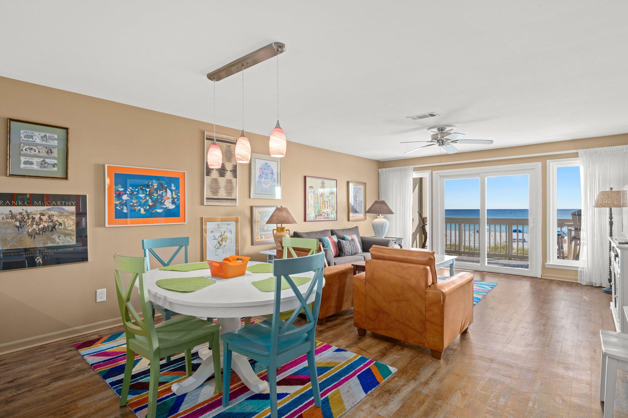 23011 Front Beach Road, Unit F7 Panama City Beach, FL 32413 - Photo 14 of 31 a living room with furniture and wooden floor