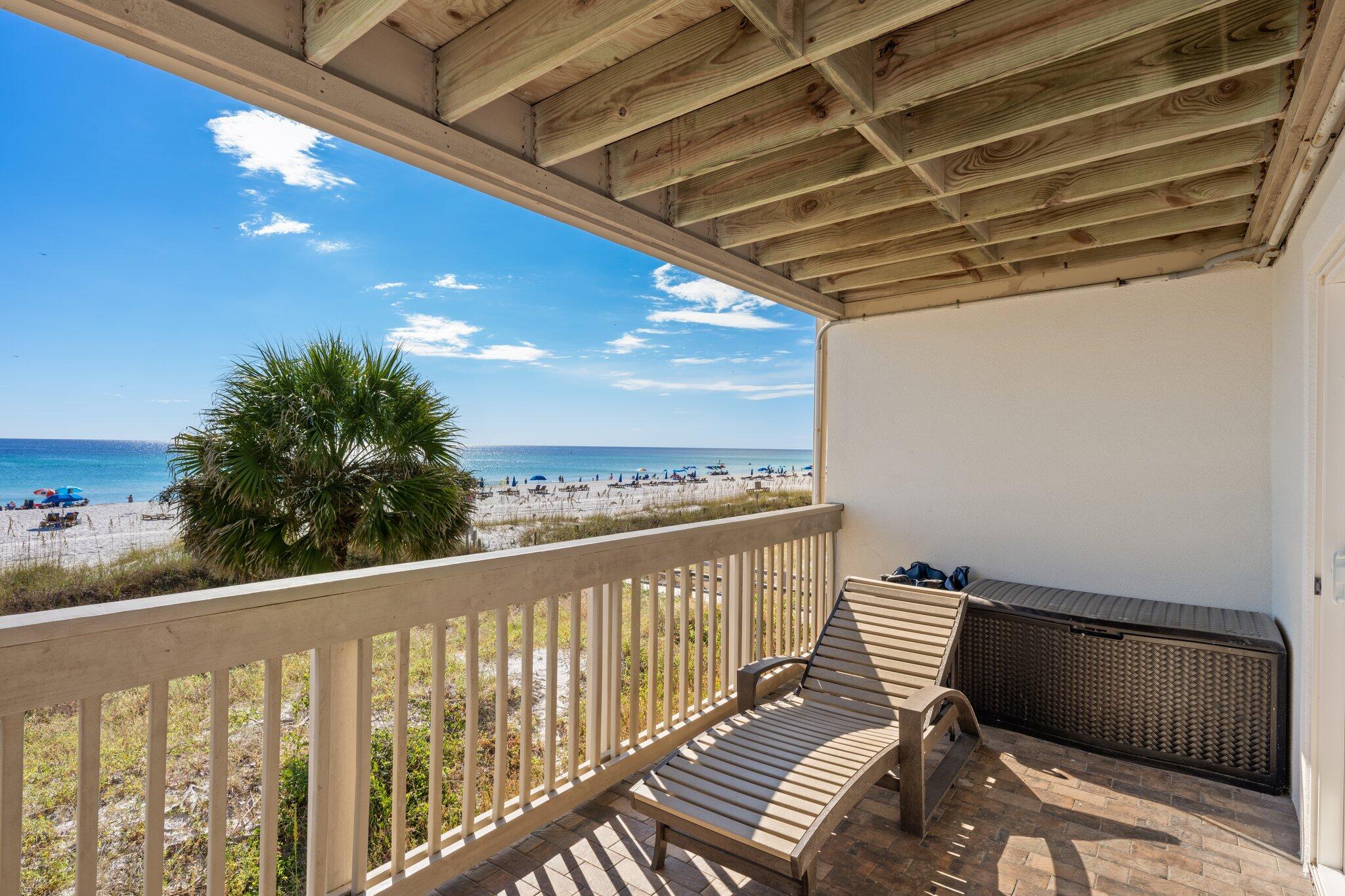 23011 Front Beach Road, Unit F7 Panama City Beach, FL 32413 - Photo 8 of 31 a view of a balcony with wooden floor