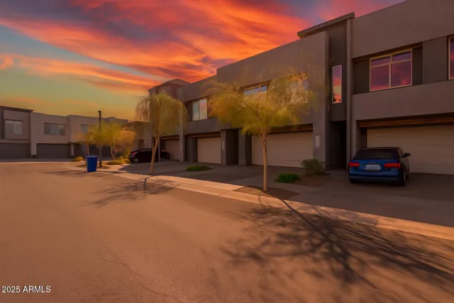 a view of a street with a building