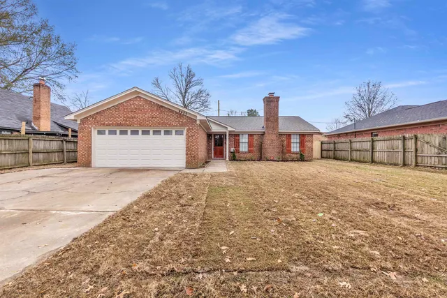 a front of a house with a outdoor space