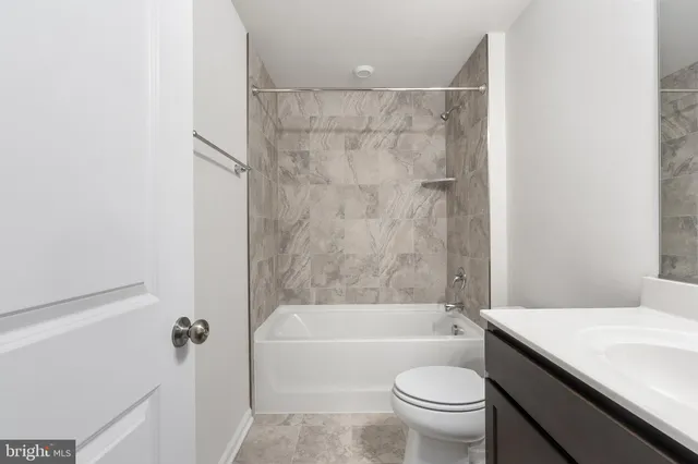 a view of a brick house with a ocean view