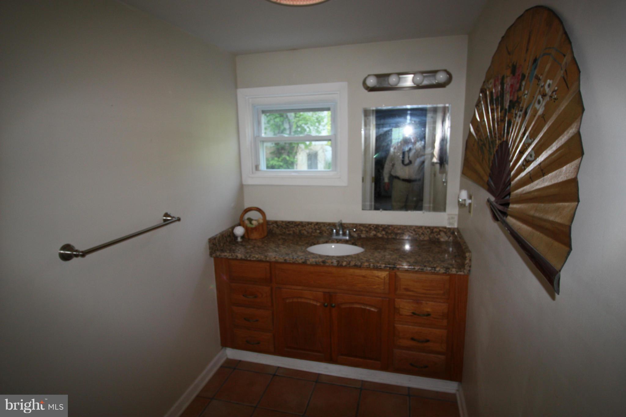 20500 Root Road Northeast Flintstone, MD 21530 - Photo 7 of 69 a bathroom with a sink and a mirror