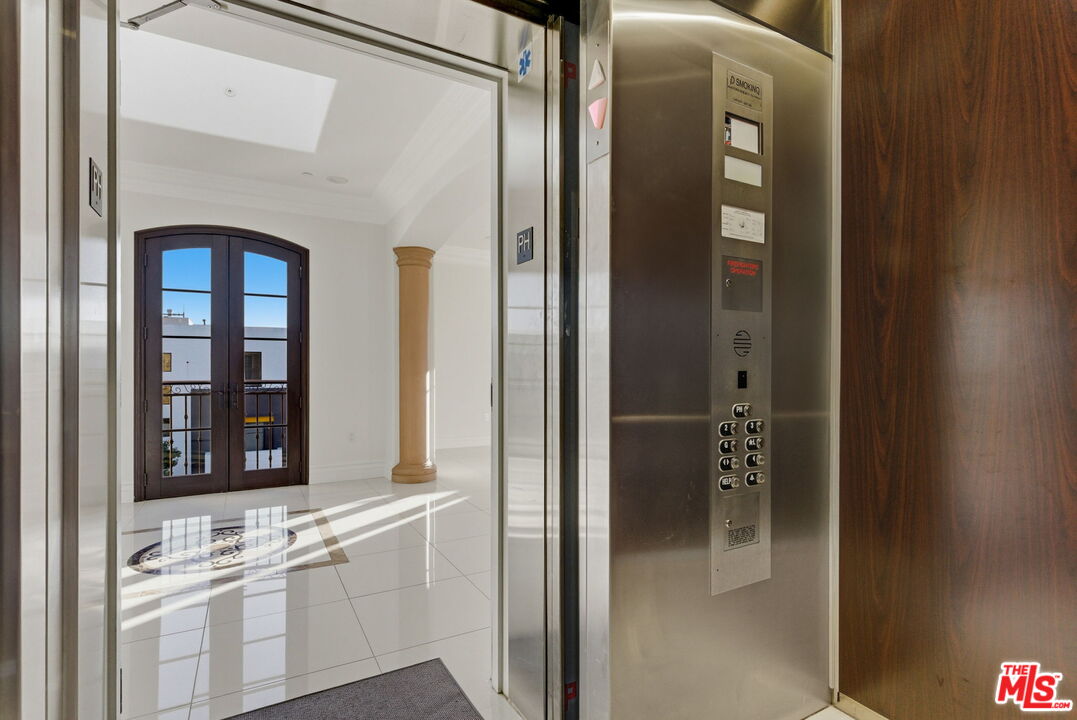 a bathroom with a shower and a sink