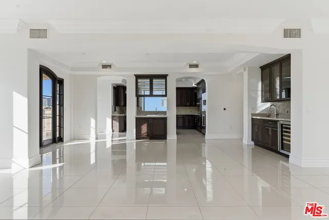 a view of a kitchen with an oven and refrigerator