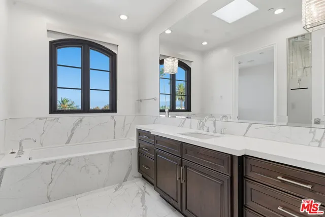 a bathroom with a sink and a bathtub