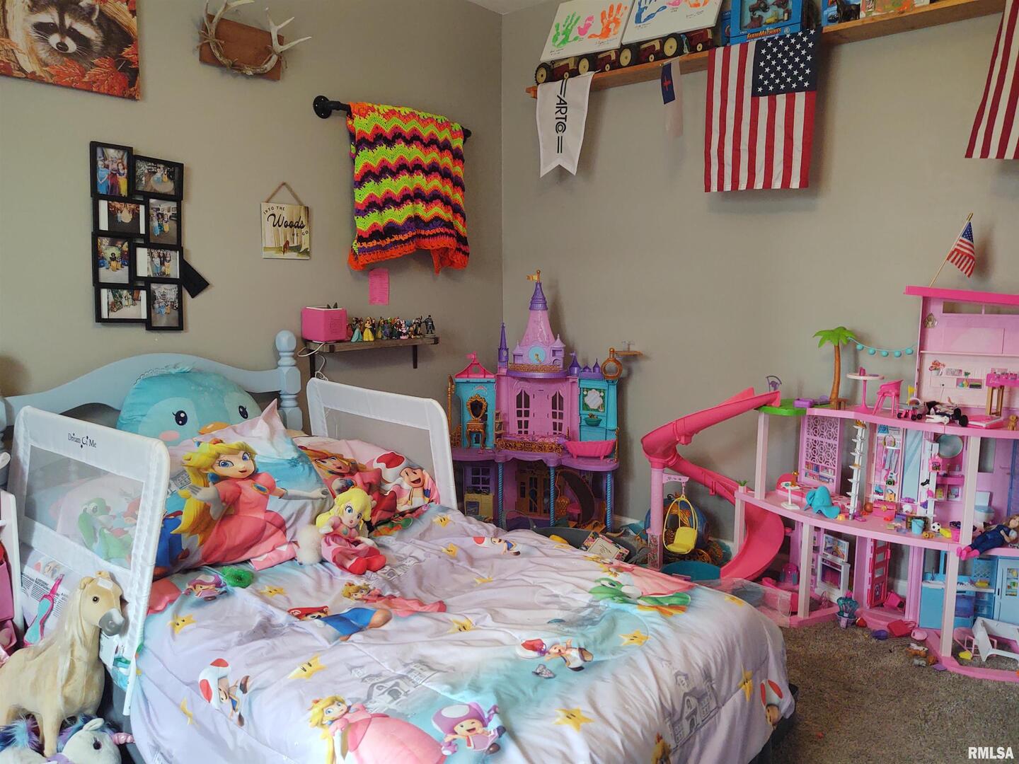 1470 Old Bloomfield Road Vienna, IL 62995 - Photo 16 of 25 a kids bedroom with a bed a baby crib and a baby crib