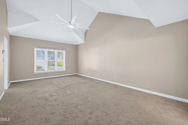 a view of a chairs and table in the patio