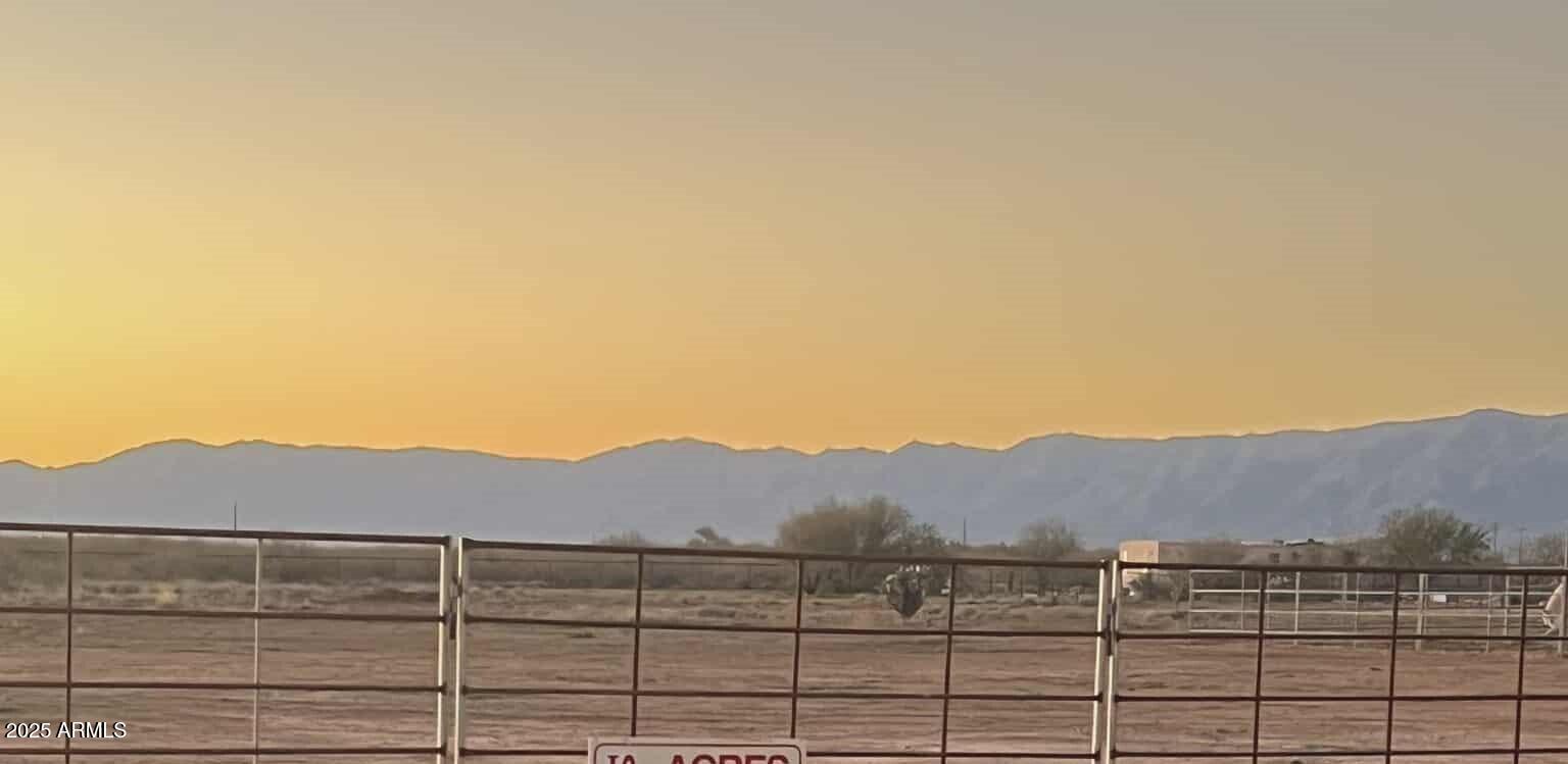 51252 West Buffalo Dog Road Aguila, AZ 85320 - Photo 9 of 27 a view of a city with mountain