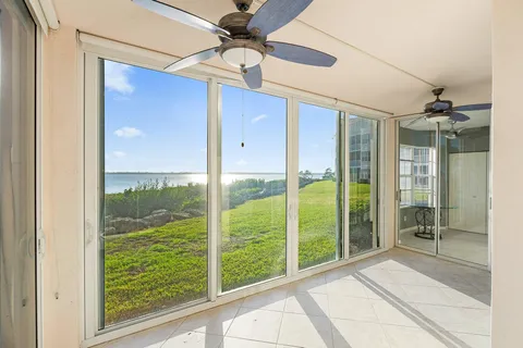 a view of a glass door and an outdoor space