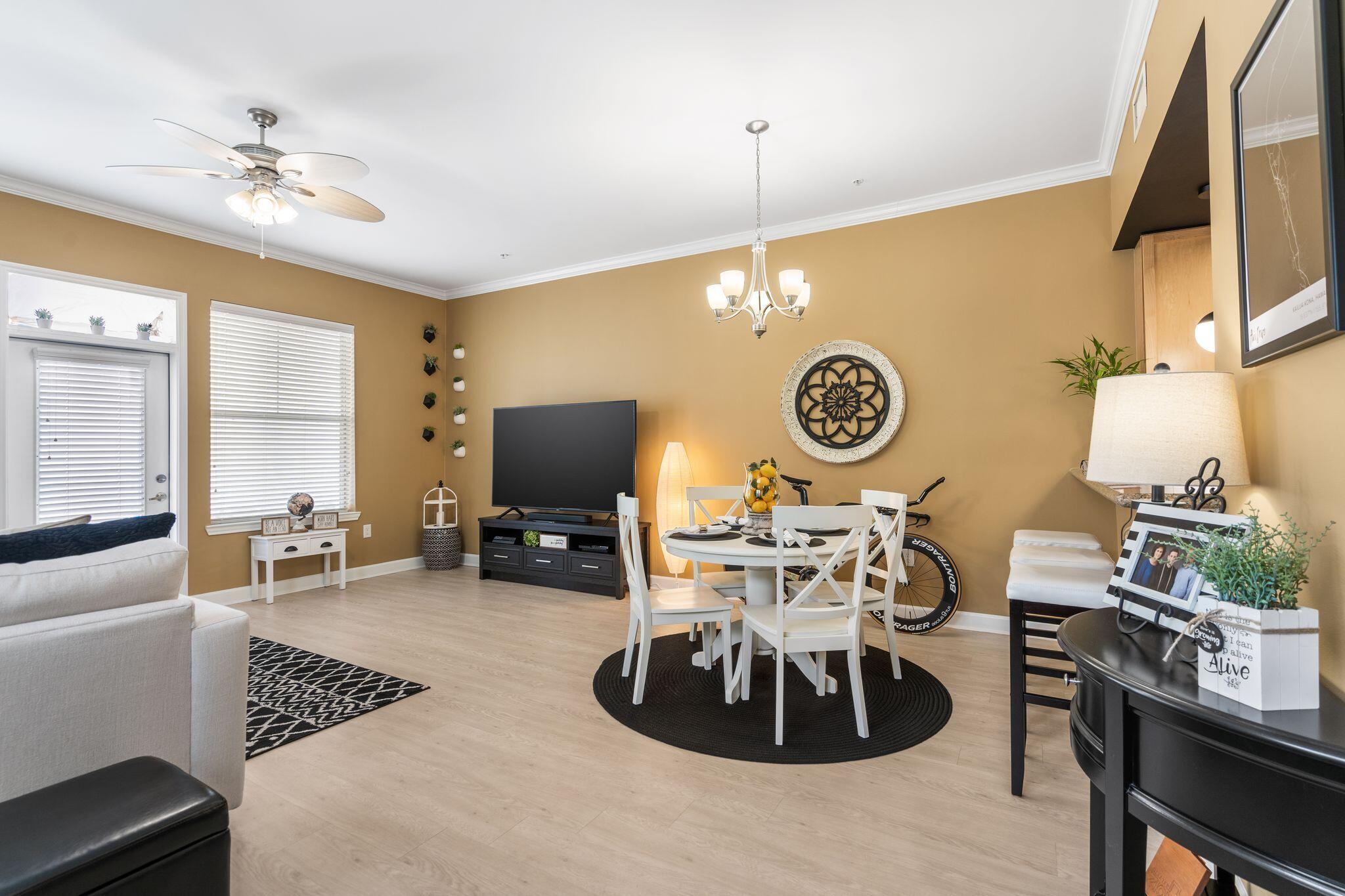8700 Front Beach Road, Unit 6310 Panama City Beach, FL 32407 - Photo 11 of 42 a view of a dining room with furniture