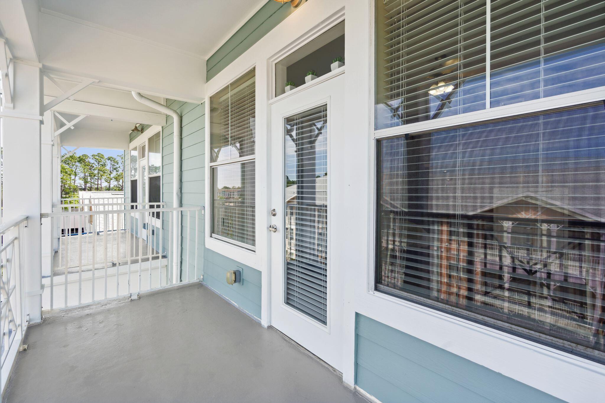 8700 Front Beach Road, Unit 6310 Panama City Beach, FL 32407 - Photo 17 of 42 a view of a balcony with an outdoor space