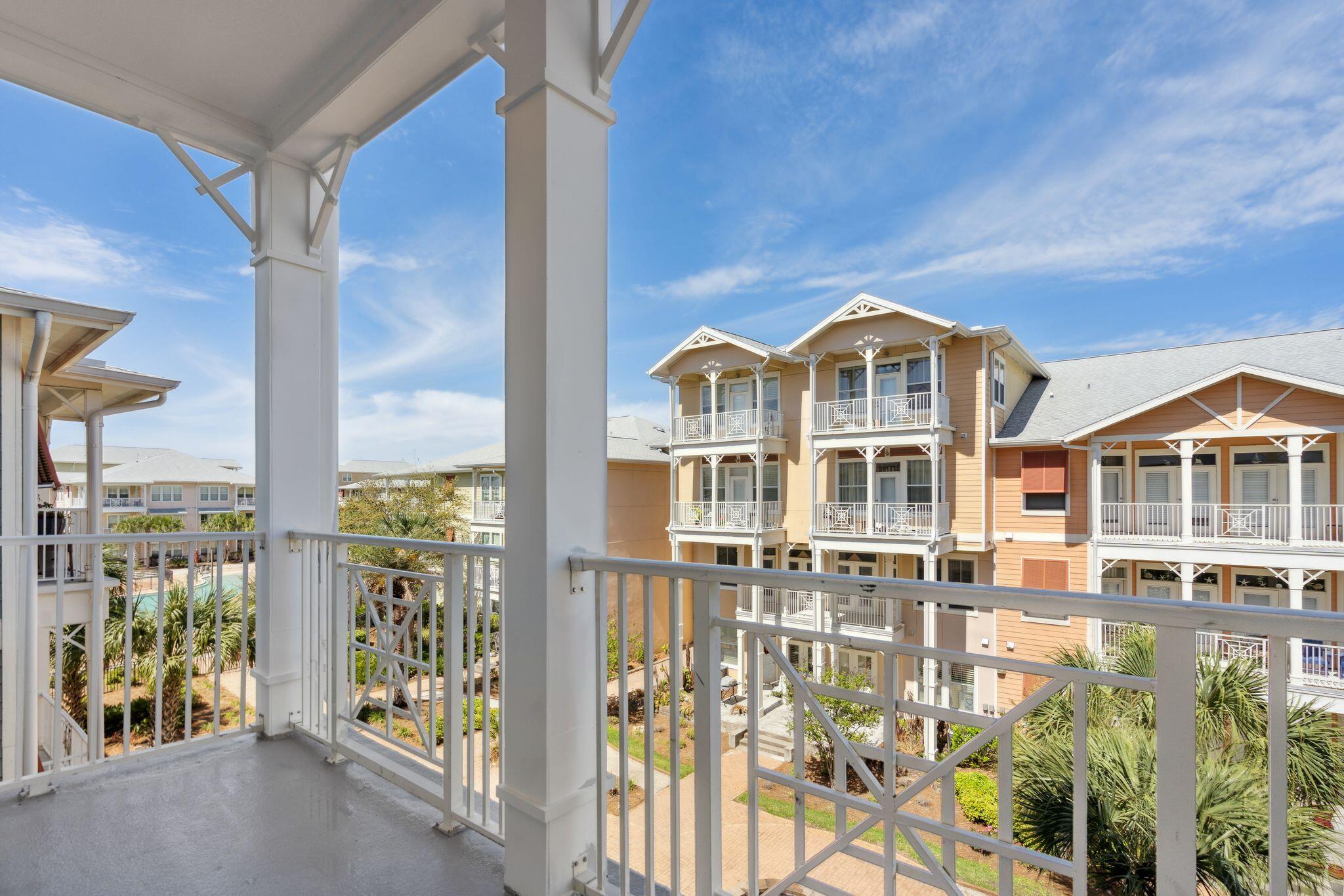 8700 Front Beach Road, Unit 6310 Panama City Beach, FL 32407 - Photo 18 of 42 a front view of a building with a garden