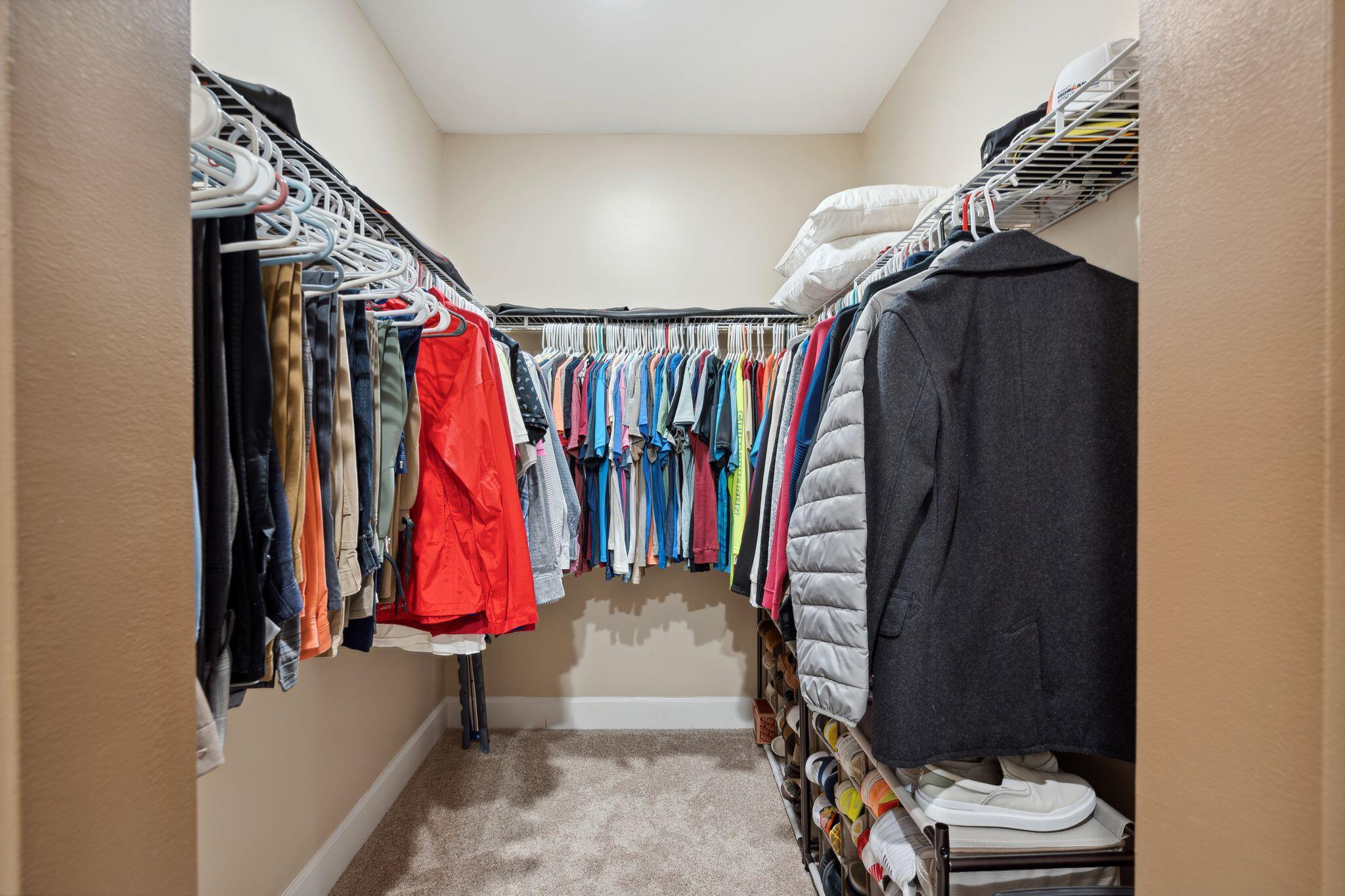 8700 Front Beach Road, Unit 6310 Panama City Beach, FL 32407 - Photo 23 of 42 a view of walk in closet with clothes
