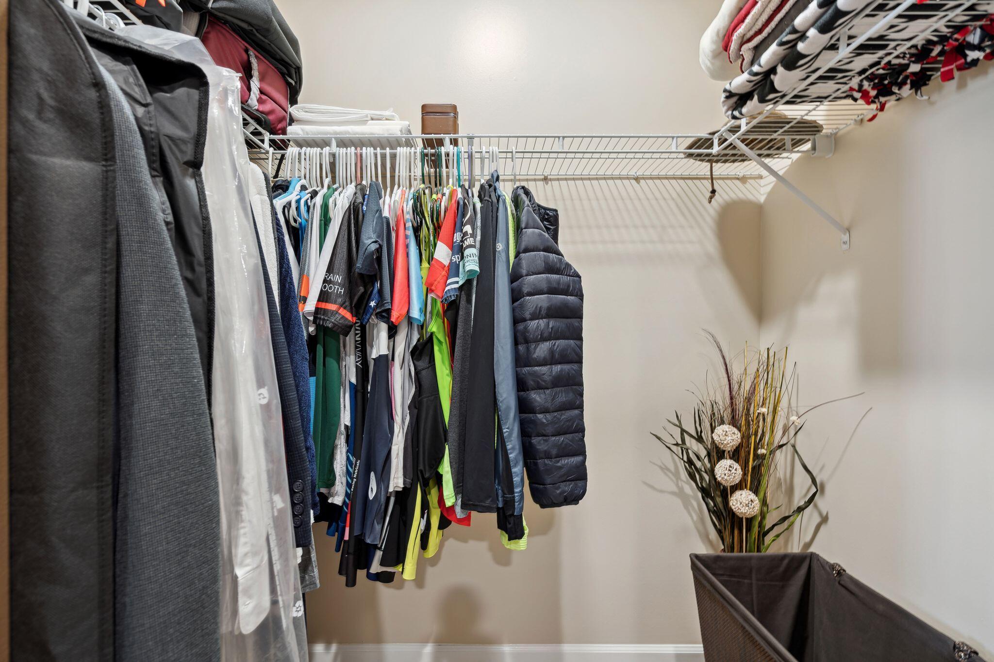 8700 Front Beach Road, Unit 6310 Panama City Beach, FL 32407 - Photo 24 of 42 a view of walk in closet with clothes