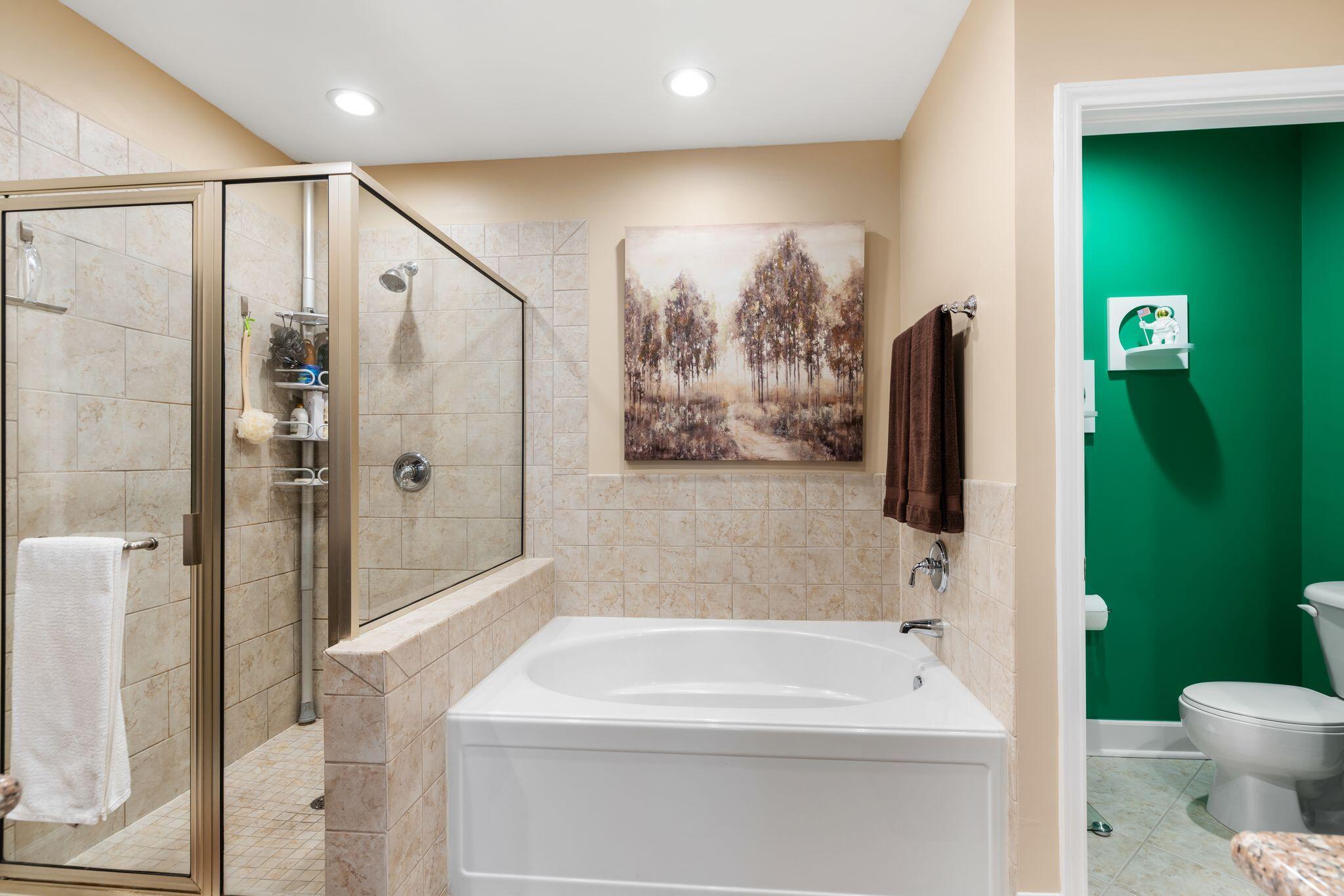 8700 Front Beach Road, Unit 6310 Panama City Beach, FL 32407 - Photo 27 of 42 a bathroom with a sink a toilet and shower