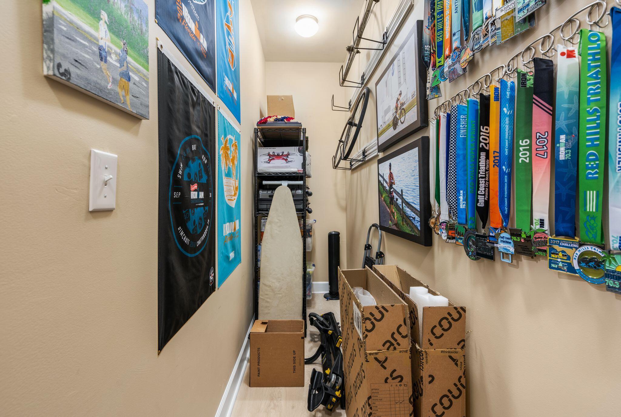 8700 Front Beach Road, Unit 6310 Panama City Beach, FL 32407 - Photo 29 of 42 a view of walk in closet with clothes and shoes
