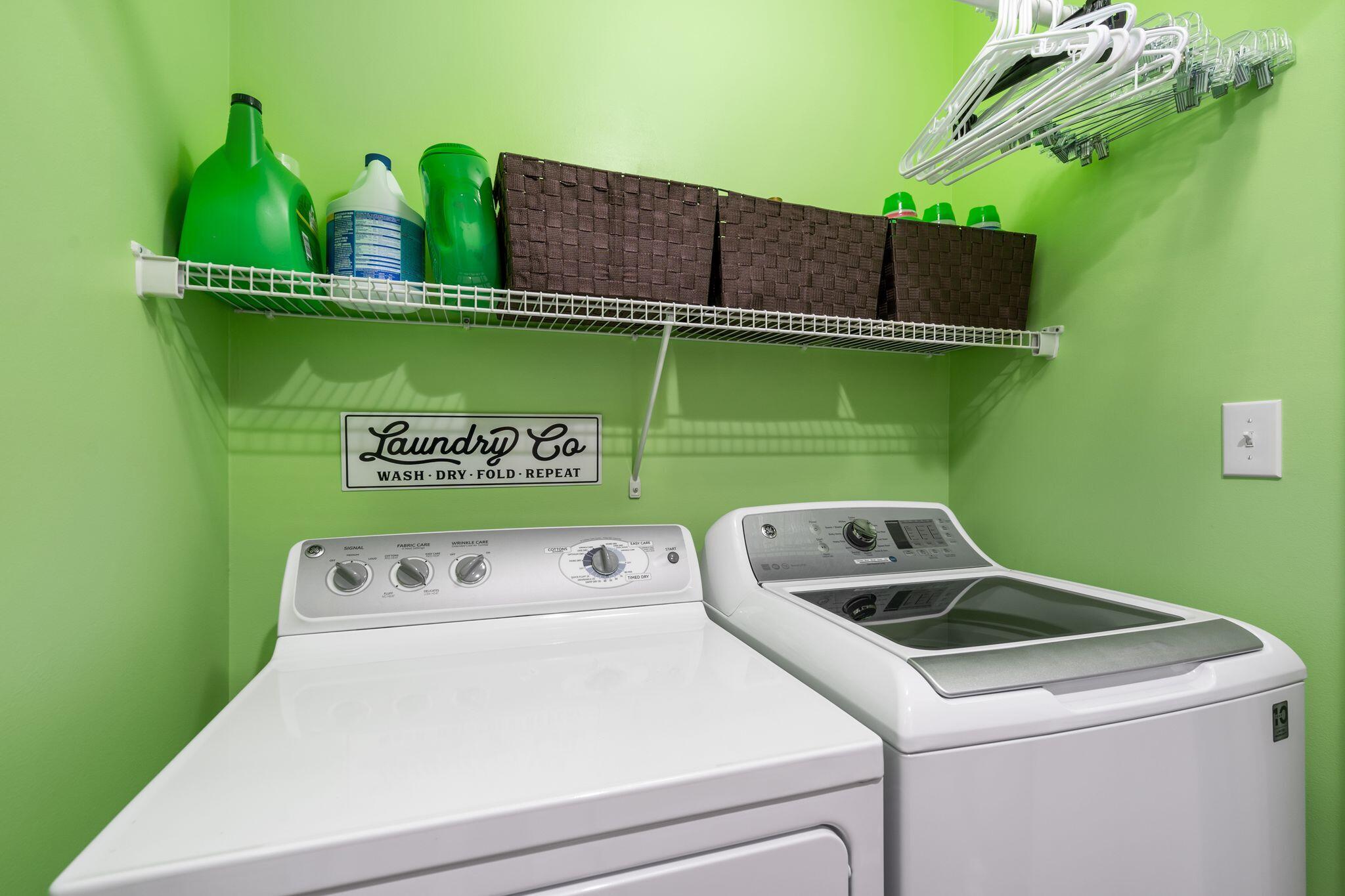 8700 Front Beach Road, Unit 6310 Panama City Beach, FL 32407 - Photo 30 of 42 a close up of a wall with a washer and dryer