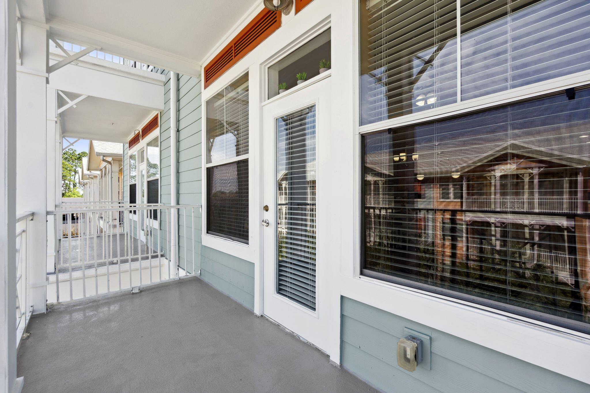 8700 Front Beach Road, Unit 6310 Panama City Beach, FL 32407 - Photo 32 of 42 a view of a porch with stairs
