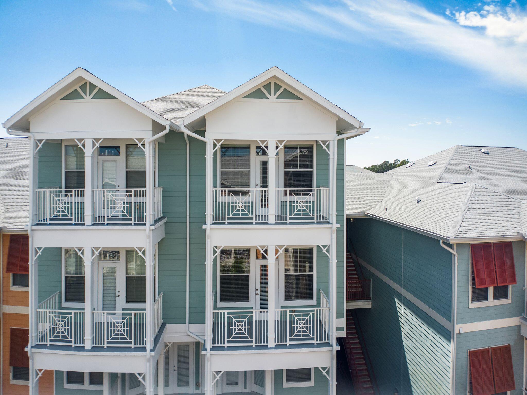 8700 Front Beach Road, Unit 6310 Panama City Beach, FL 32407 - Photo 34 of 42 front view of a house with large windows