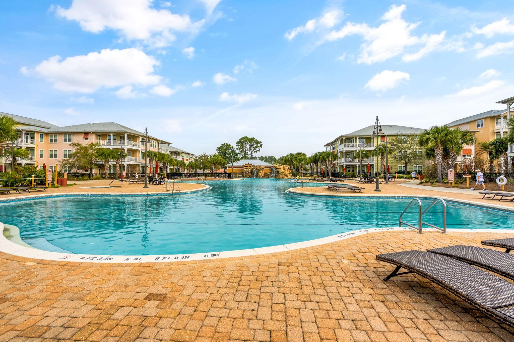 8700 Front Beach Road, Unit 6310 Panama City Beach, FL 32407 - Photo 38 of 42 a view of a lake with a building in the background