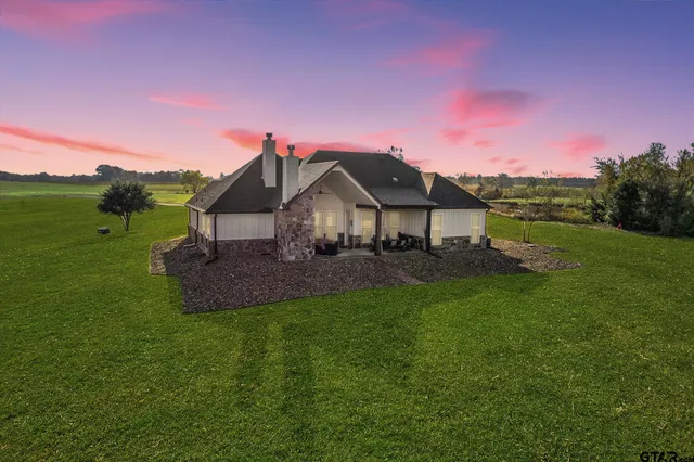 a house view with a garden space