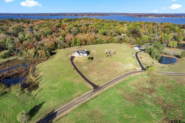 a view of swimming pool with a yard