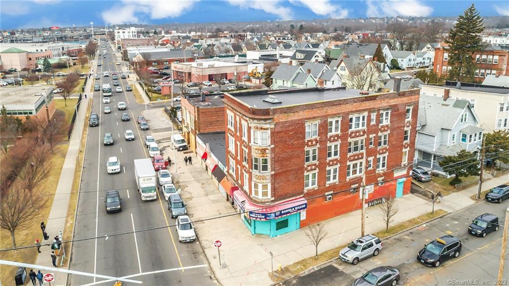 an aerial view of residential building and parking space