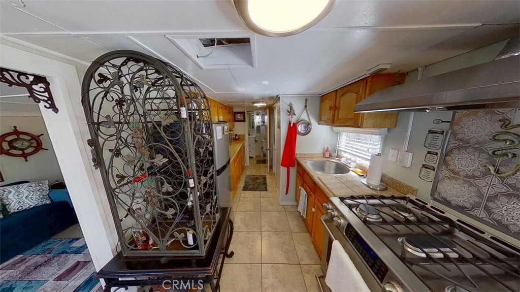 85 Riversea Road Seal Beach, CA 90740 - Photo 11 of 18 a view of a entryway with lots of stuff