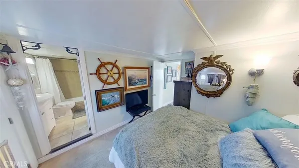 a bedroom with a bed and a closet