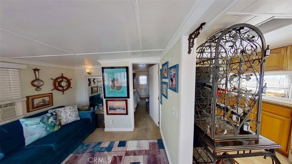 85 Riversea Road Seal Beach, CA 90740 - Photo 2 of 18 a view of an entryway with furniture and rug