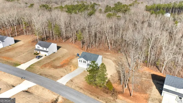 a view of garage and yard