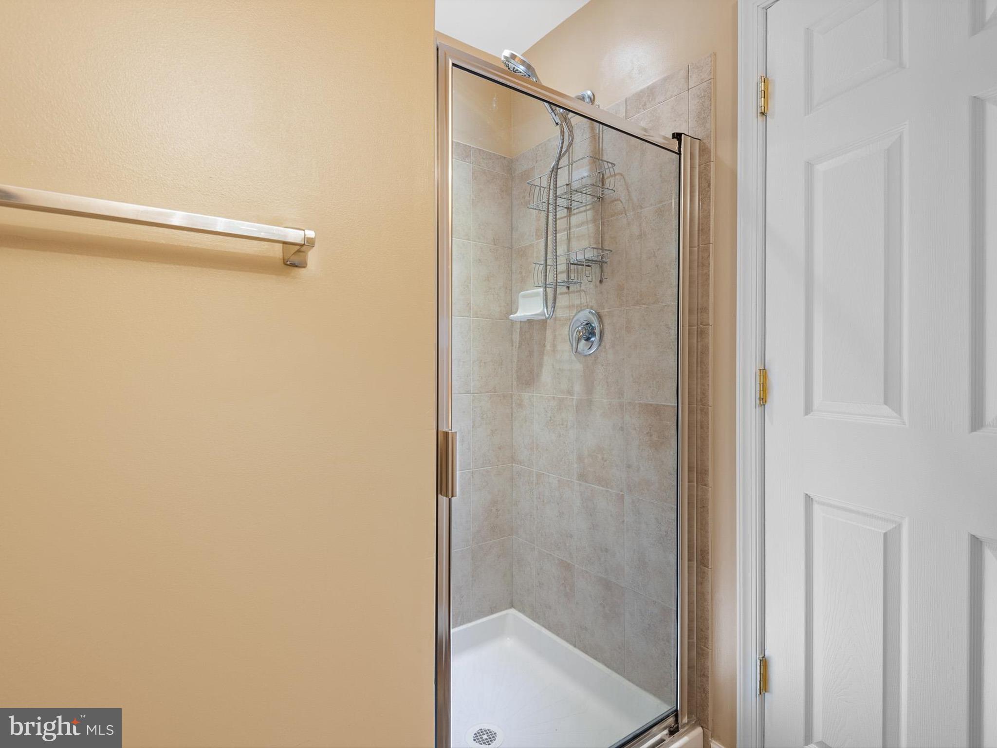 1092 Worth Lane, Unit BL12 Claymont, DE 19703 - Photo 12 of 20 a bathroom with a glass shower door