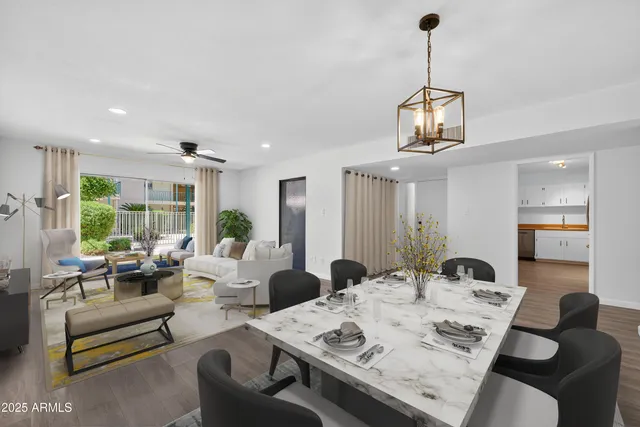 a living room with furniture and a table