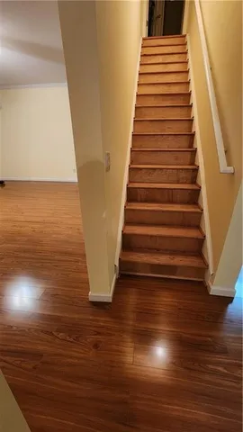 a view of entryway with wooden floor