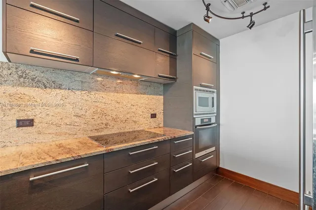 a view of cabinets and window