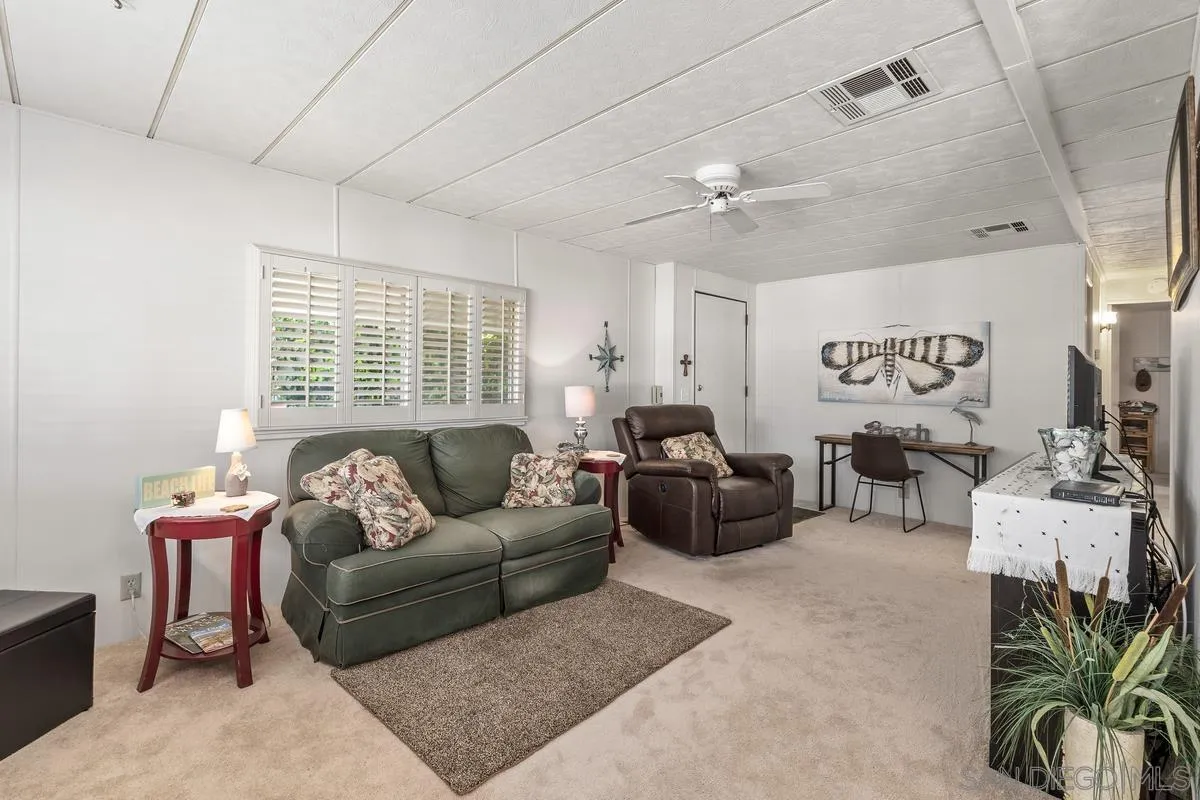 4747 Oak Crest Road, Unit 39 Fallbrook, CA 92028 - Photo 13 of 38 a living room with furniture and a window