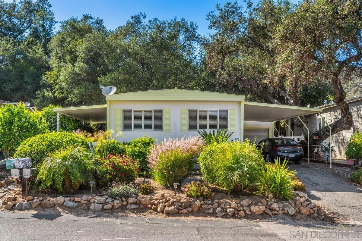 4747 Oak Crest Road, Unit 39 Fallbrook, CA 92028 - Photo 2 of 38 a front view of house with yard and green space
